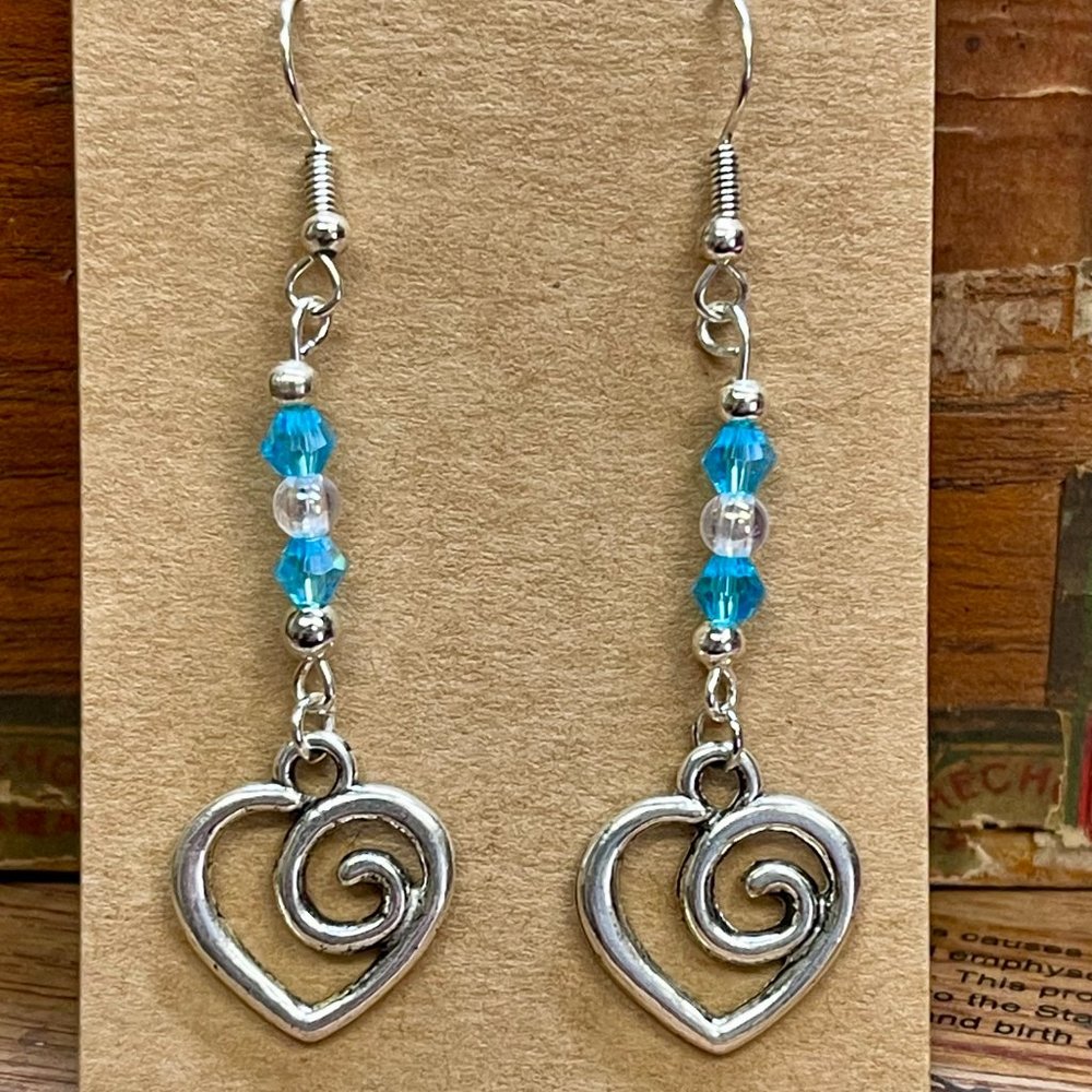 Silver Colored Heart Shaped Earrings. Brand New!